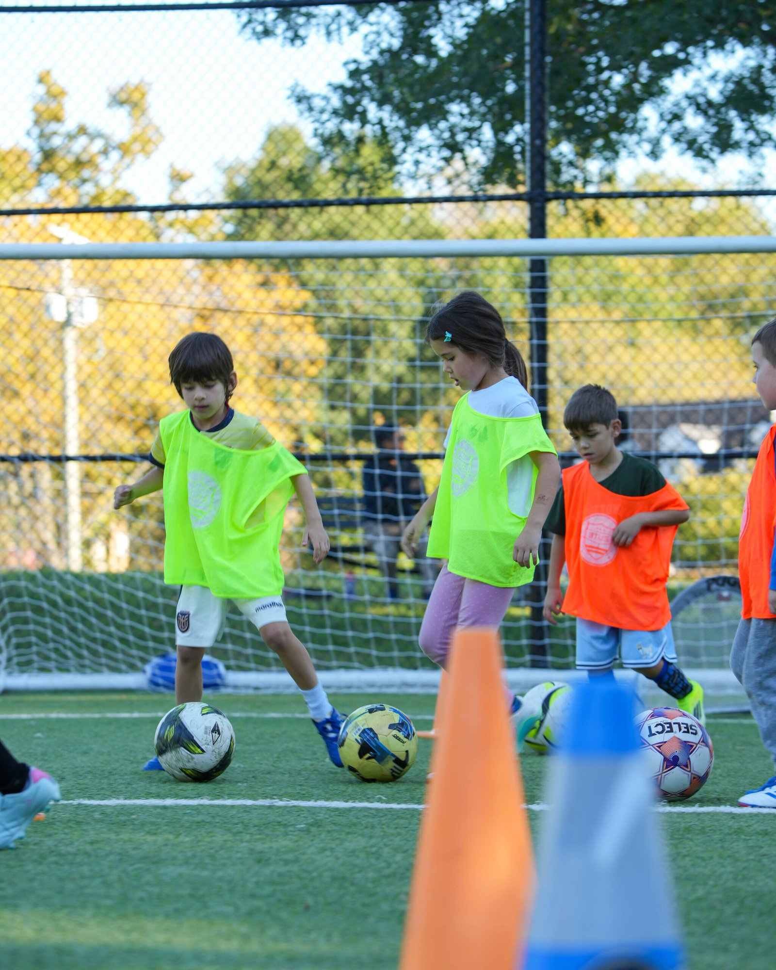 Young District Elite FC players developing their soccer skills